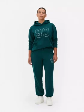 Pantaloni de trening cu manșete și imprimeu