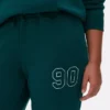 Pantaloni de trening cu manșete și imprimeu Pantaloni de trening cu manșete și imprimeu