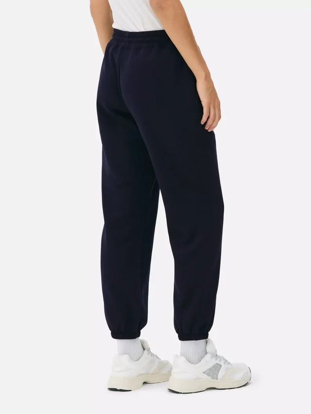 Pantaloni de trening cu manșete și imprimeu Pantaloni de trening cu manșete și imprimeu