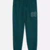 Pantaloni de trening cu manșete și imprimeu Pantaloni de trening cu manșete și imprimeu