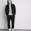 Pantaloni de Trening elastici la talie, cu manșete Pantaloni de Trening elastici la talie, cu manșete