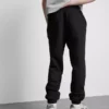 Pantaloni de Trening elastici la talie, cu manșete Pantaloni de Trening elastici la talie, cu manșete