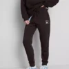 Pantaloni de Trening skinny din amestec de bumbac, cu imprimeu Pantaloni de Trening skinny din amestec de bumbac, cu imprimeu