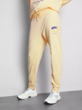 Pantaloni de Trening skinny din amestec de bumbac, cu imprimeu Pantaloni de Trening skinny din amestec de bumbac, cu imprimeu