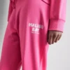 Pantaloni de Trening skinny din amestec de bumbac, cu imprimeu Pantaloni de Trening skinny din amestec de bumbac, cu imprimeu