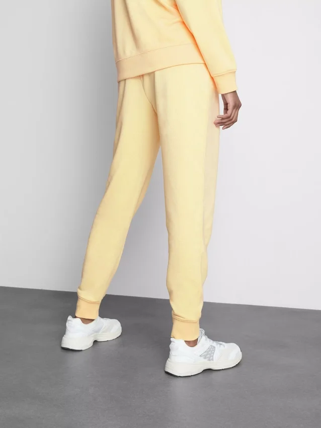 Pantaloni de Trening skinny din amestec de bumbac, cu imprimeu Pantaloni de Trening skinny din amestec de bumbac, cu imprimeu