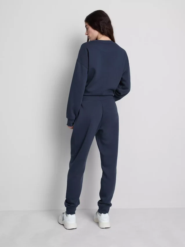 Pantaloni de Trening skinny din amestec de bumbac, cu imprimeu Pantaloni de Trening skinny din amestec de bumbac, cu imprimeu