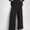 Pantaloni largi, cu textură și talie medie Pantaloni largi, cu textură și talie medie