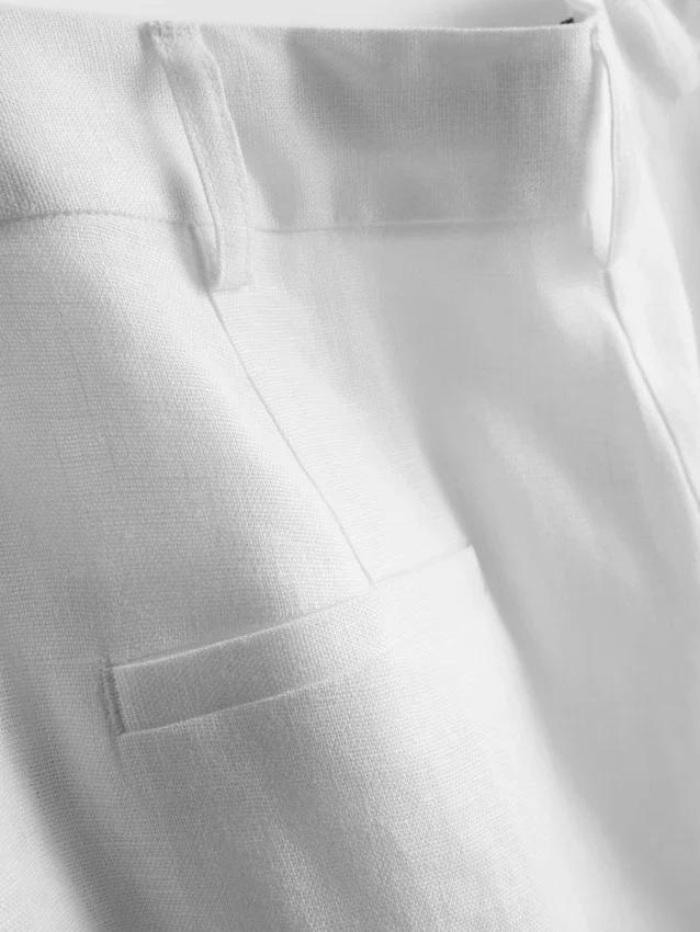 Pantaloni largi din in plisați „The Edit” Pantaloni largi din in plisați „The Edit”
