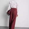 Pantaloni palazzo cu detaliu fundă Pantaloni palazzo cu detaliu fundă
