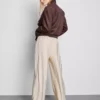 Pantaloni palazzo cu detaliu fundă