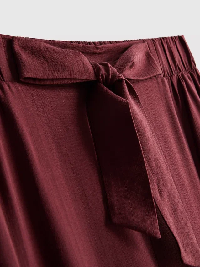 Pantaloni palazzo cu detaliu fundă Pantaloni palazzo cu detaliu fundă