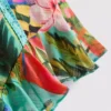 Pantaloni scurți cu volane și imprimeu tropical