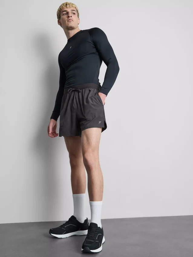 Pantaloni scurți de alergare cu elemente reflectorizante Pantaloni scurți de alergare cu elemente reflectorizante