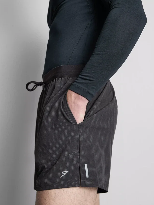Pantaloni scurți de alergare cu elemente reflectorizante Pantaloni scurți de alergare cu elemente reflectorizante