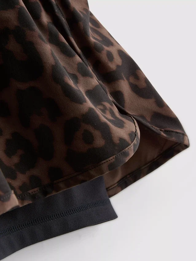 Pantaloni scurți de alergare cu imprimeu leopard țesut Pantaloni scurți de alergare cu imprimeu leopard țesut