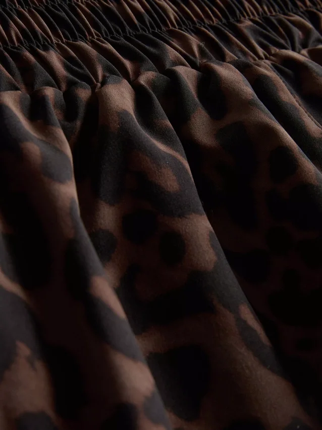 Pantaloni scurți de alergare cu imprimeu leopard țesut Pantaloni scurți de alergare cu imprimeu leopard țesut