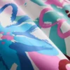 Pantaloni scurți de baie cu imprimeu floral tip graffiti