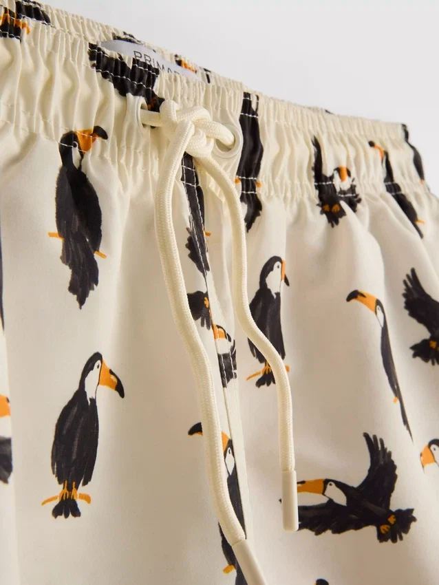 Pantaloni scurți de baie cu imprimeu Toucan și talie cu șnur Pantaloni scurți de baie cu imprimeu Toucan și talie cu șnur