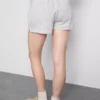 Pantaloni scurți de casă din bumbac cu tiv despicat Pantaloni scurți de casă din bumbac cu tiv despicat