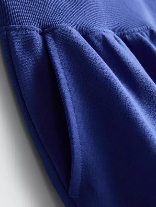 Pantaloni scurți de casă din bumbac cu tiv despicat Pantaloni scurți de casă din bumbac cu tiv despicat