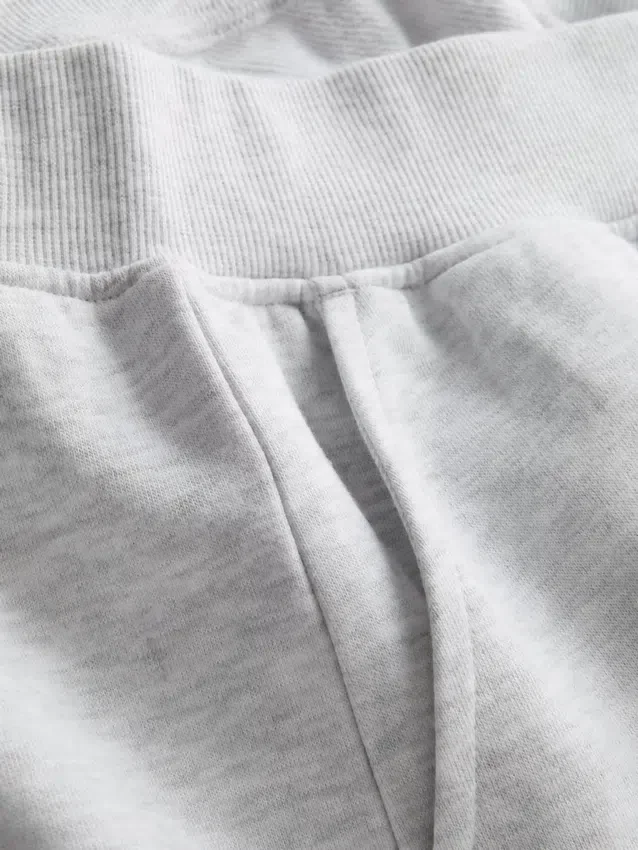 Pantaloni scurți de casă din bumbac cu tiv despicat Pantaloni scurți de casă din bumbac cu tiv despicat