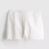 Pantaloni scurți din bumbac cu borduri festonate și broderie Pantaloni scurți din bumbac cu borduri festonate și broderie