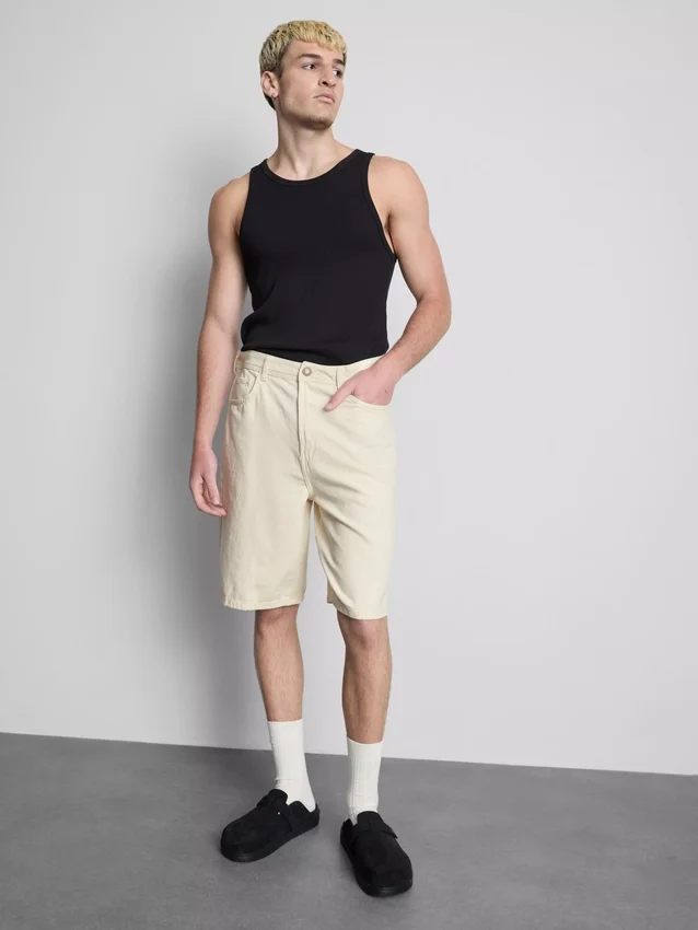 Pantaloni scurți din denim cu croială lejeră Pantaloni scurți din denim cu croială lejeră