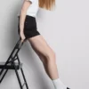 Pantaloni scurți din denim cu talie medie și tiv răsfrânt Pantaloni scurți din denim cu talie medie și tiv răsfrânt