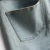 Pantaloni scurți din denim cu talie medie și tiv răsfrânt Pantaloni scurți din denim cu talie medie și tiv răsfrânt