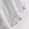 Pantaloni scurți din denim cu volane la tiv Pantaloni scurți din denim cu volane la tiv