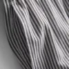 Pantaloni scurți oxford cu dungi și talie înaltă Pantaloni scurți oxford cu dungi și talie înaltă