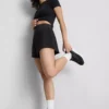 Pantaloni scurți sport din țesătură, care modelează silueta