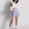 Pantaloni Scurți sportivi cu inserții din plasă Pantaloni Scurți sportivi cu inserții din plasă