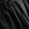 Pantaloni utilitari cu croi larg și detalii la cusături Pantaloni utilitari cu croi larg și detalii la cusături