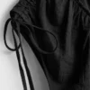 Salopetă cu decolteu în V și picioare balon Salopetă cu decolteu în V și picioare balon
