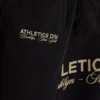 Set hanorac cu glugă și pantaloni de Trening din colecția Athletics Set hanorac cu glugă și pantaloni de Trening din colecția Athletics
