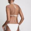 Slip de bikini cu broderie și legături laterale Slip de bikini cu broderie și legături laterale
