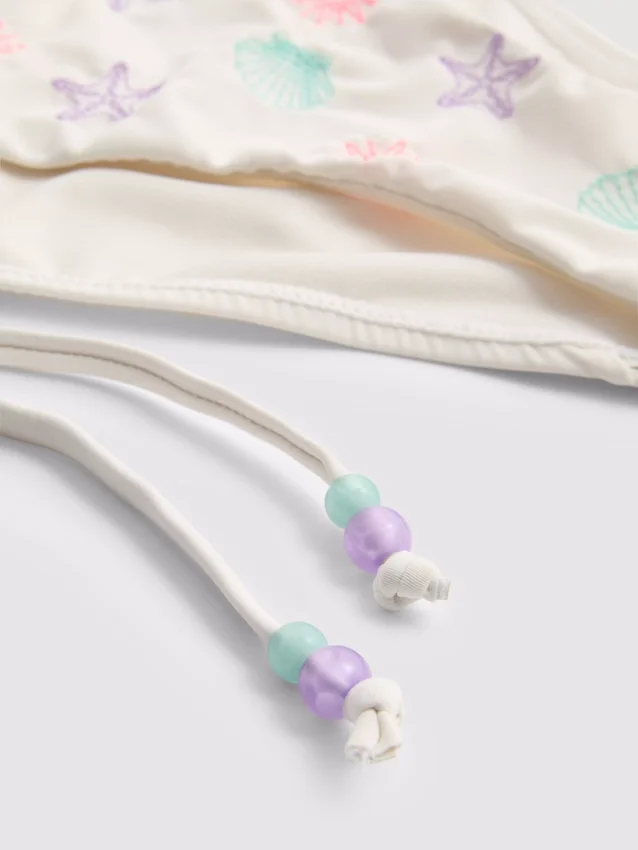 Slip de bikini cu broderie și legături laterale Slip de bikini cu broderie și legături laterale