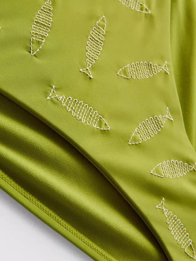 Slip de bikini cu broderie și legături laterale Slip de bikini cu broderie și legături laterale