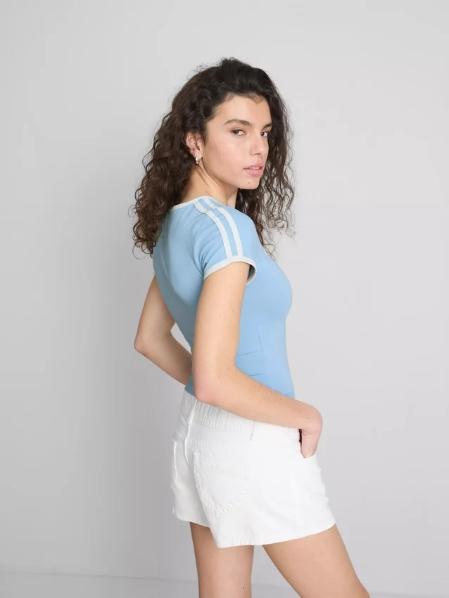 The Primark Scene | Tricou pentru bebeluși din bumbac cu imprimeu grafic The Primark Scene | Tricou pentru bebeluși din bumbac cu imprimeu grafic