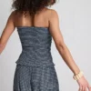 Top bandeau cu volane în carouri de la Paula Echevarría Top bandeau cu volane în carouri de la Paula Echevarría