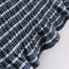 Top bandeau cu volane în carouri de la Paula Echevarría Top bandeau cu volane în carouri de la Paula Echevarría