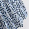 Top cami din bumbac cu decupaje Top cami din bumbac cu decupaje