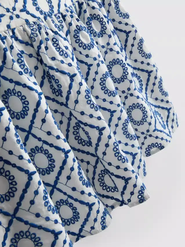 Top cami din bumbac cu decupaje Top cami din bumbac cu decupaje