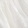 Top cu bretele subțiri, din bumbac, cu tiv peplum brodat