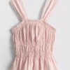 Top fără mâneci cu tiv peplum plisat