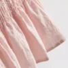 Top fără mâneci cu tiv peplum plisat