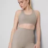 Top scurt de performanță Bodysculpt cu decupaje Top scurt de performanță Bodysculpt cu decupaje