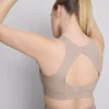 Top scurt de performanță Bodysculpt cu decupaje Top scurt de performanță Bodysculpt cu decupaje